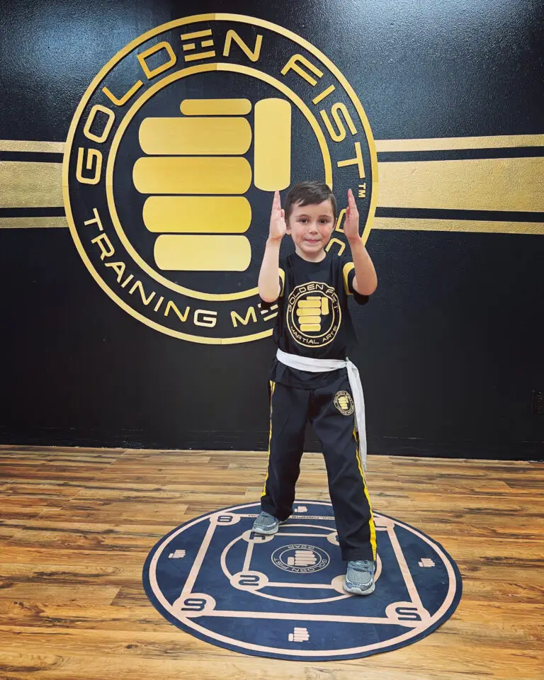 Student in fighting stance pose at Golden Fist Martial Arts for Kids (Kung Fu + Kenpo Karate) taught by Sifu Jonny Blu at Golden Fist Training Method studio in Toluca Lake, CA 91602