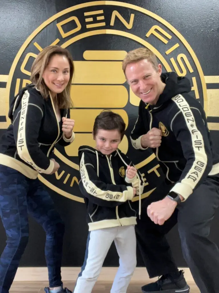 Sifu Jonny Blu Klamer with Golden Fist family members in matching training apparel